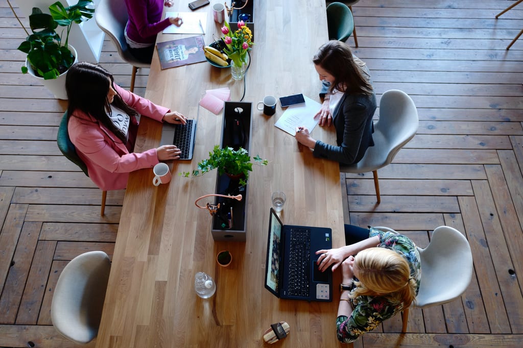 Women training and onboarding at an insurance agency
